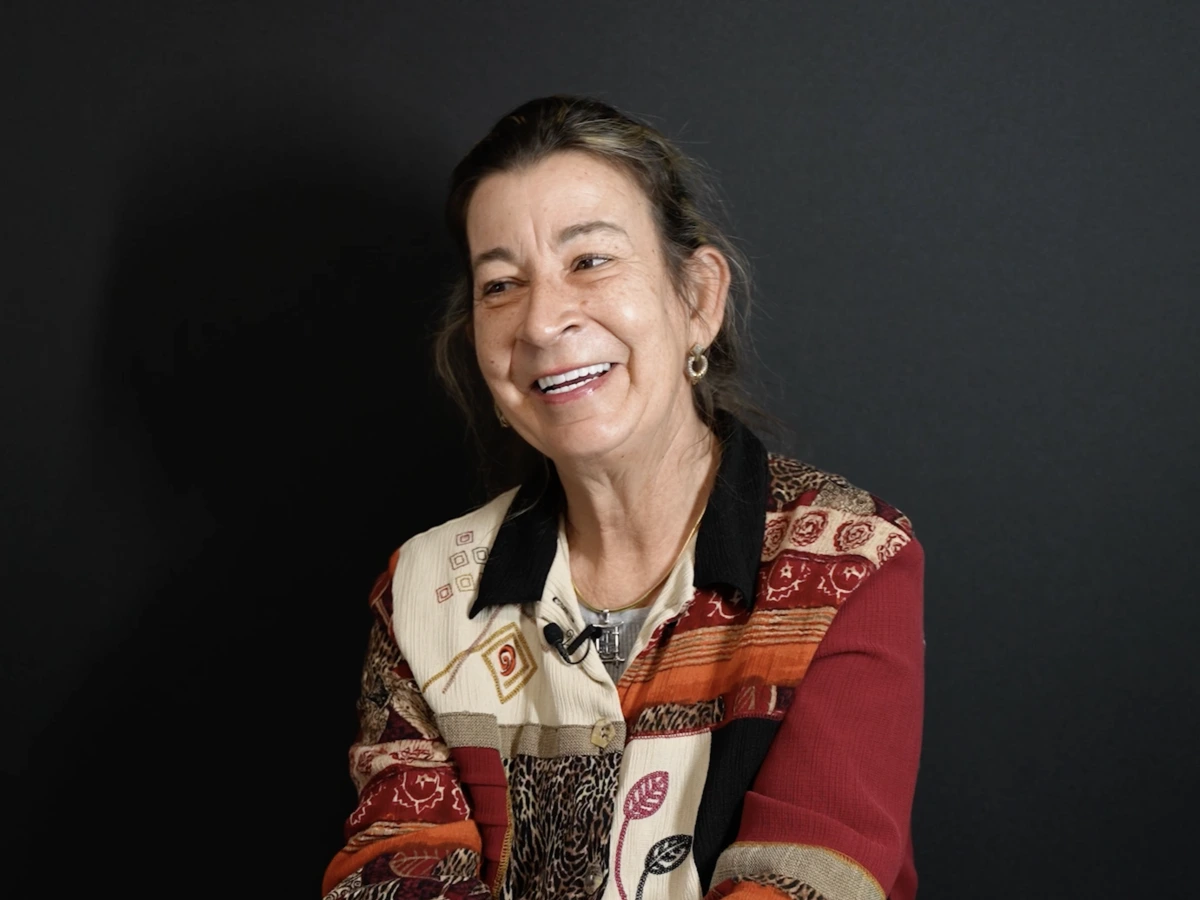 SPG patient smiling after getting dentures